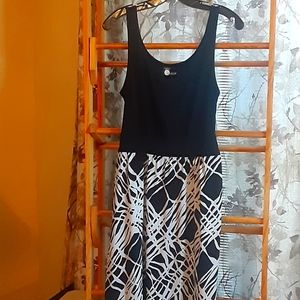Beautiful black and cream colored dress by First Option